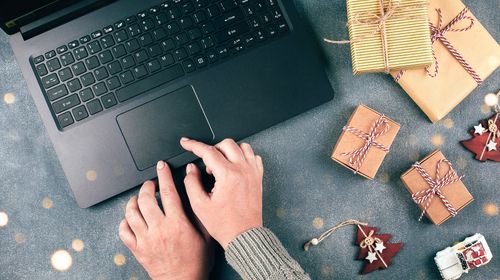 girl-makes-order-on-laptop-business-christmas-hol-2021-08-29-07-00-14-utc-min